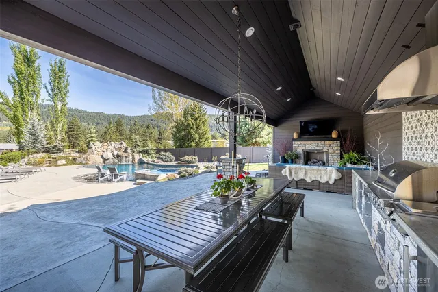 a outdoor space with patio the couches and a dining table with chairs