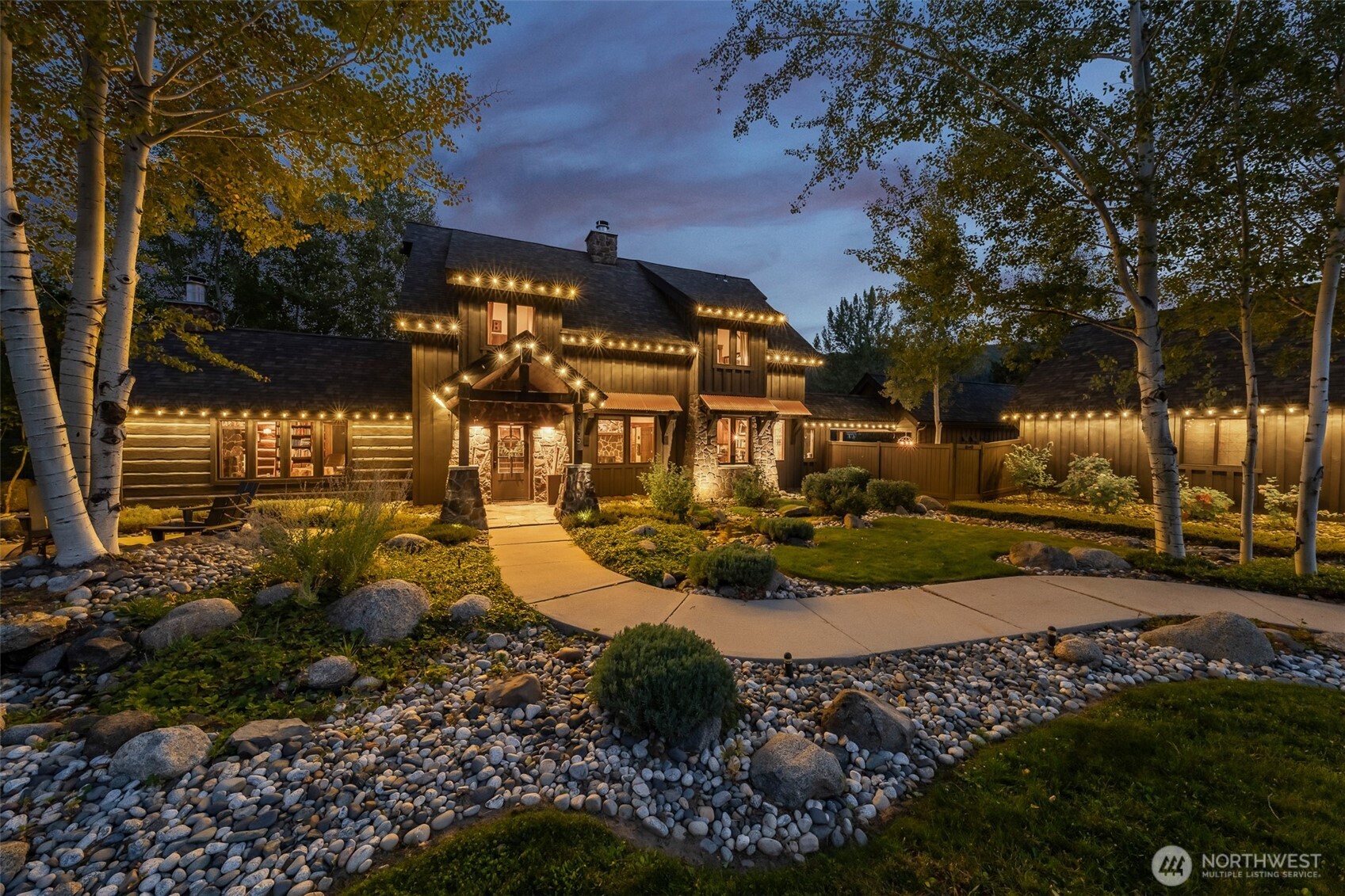 8105 Icicle Road Leavenworth, WA 98826 - Photo 3 of 40 a view of a yard with large tree