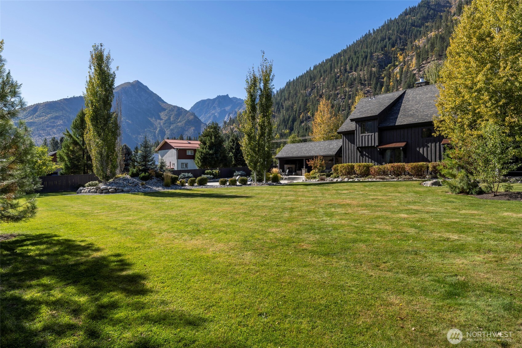 8105 Icicle Road Leavenworth, WA 98826 - Photo 38 of 40 a view of a house with a yard