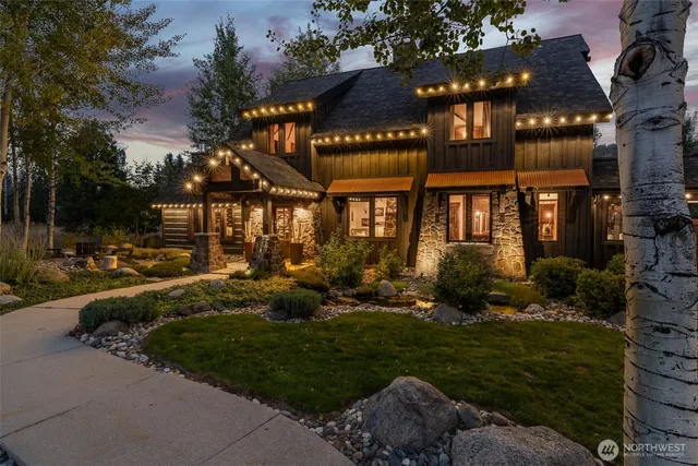a view of a house with a yard porch and sitting area