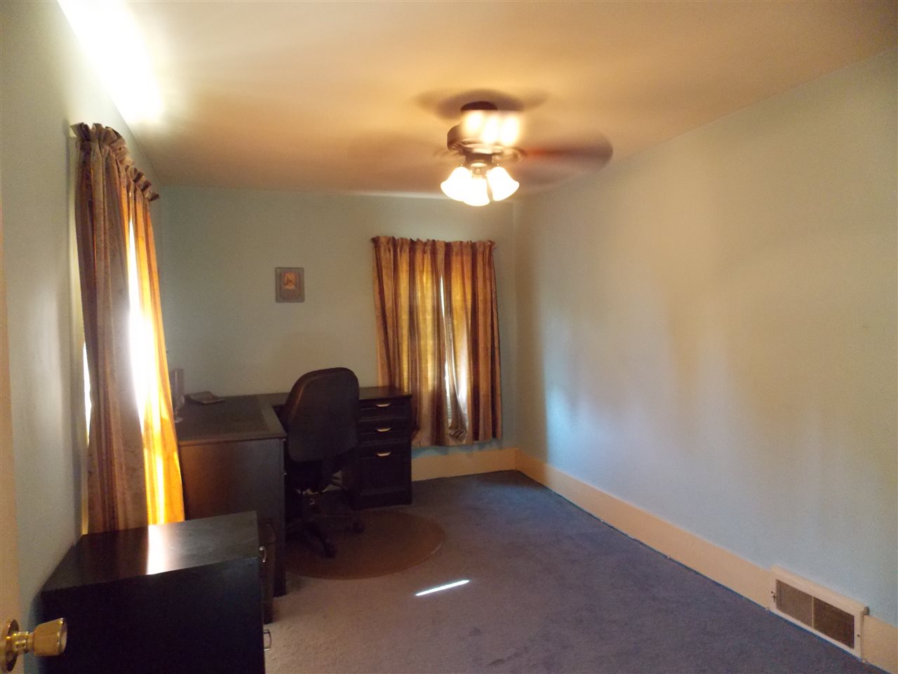 5793 Town Line Road Leaf River, IL 61047 - Photo 5 of 11 a view of a workspace with furniture and a window