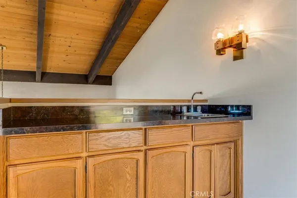 a close view of a stove and a sink
