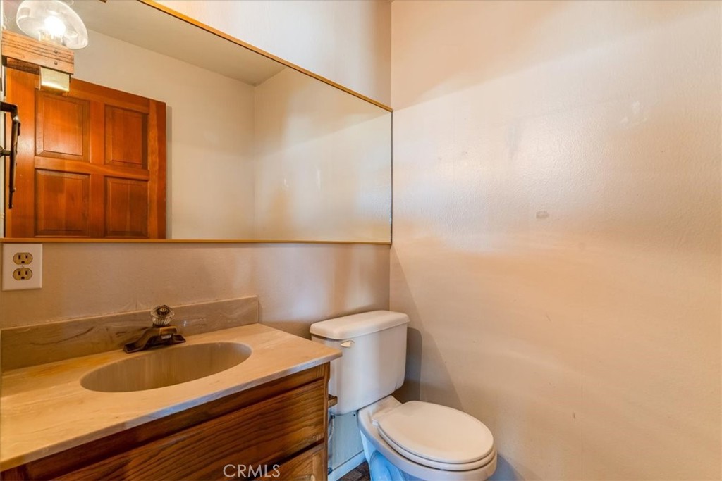 470 Warwick Street Cambria, CA 93428 - Photo 25 of 47 a bathroom with a sink and a toilet