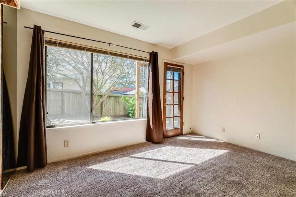 470 Warwick Street Cambria, CA 93428 - Photo 37 of 47 a view of an empty room with a window