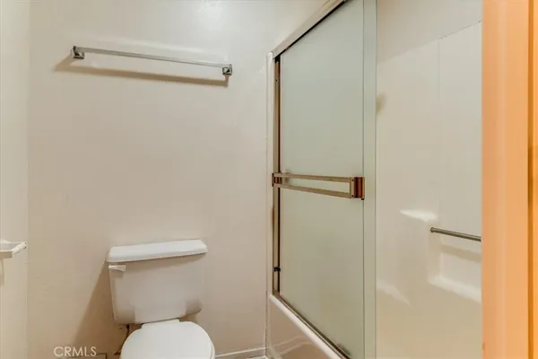 a bathroom with a tub and a sink