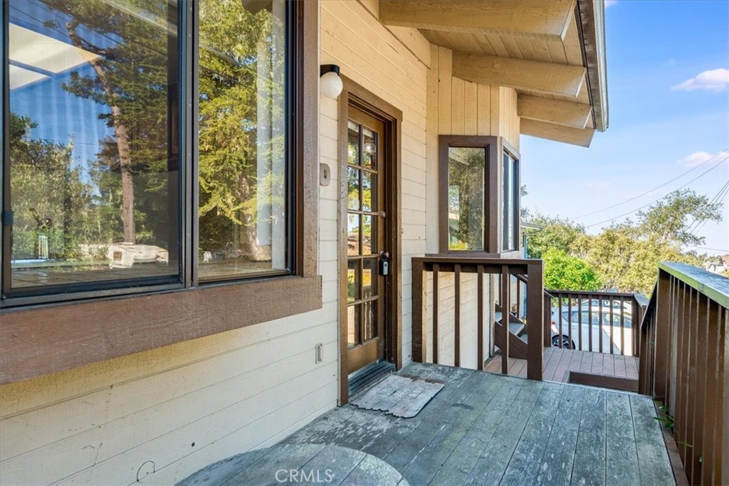 470 Warwick Street Cambria, CA 93428 - Photo 8 of 47 a view of a house with a porch