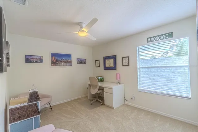 a bathroom with a sink a mirror and a shower
