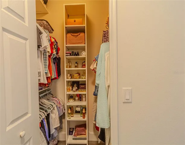 a bed room with a bed and a window