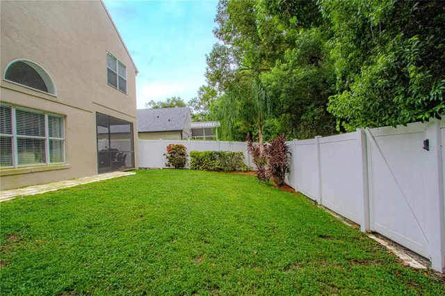 a bathroom with a sink vanity and mirror