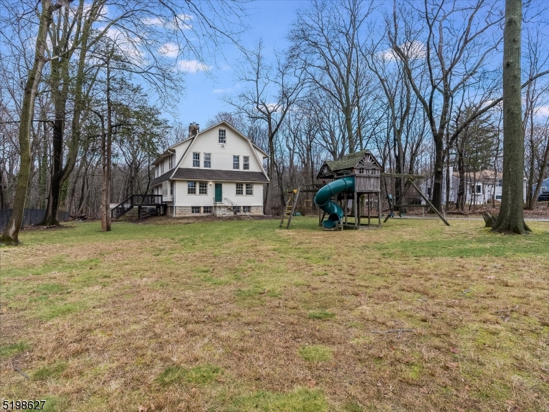 81 Alexander Avenue, Unit 1 Montclair, NJ 07043 - Photo 14 of 15 a view of a house with a yard and sitting area
