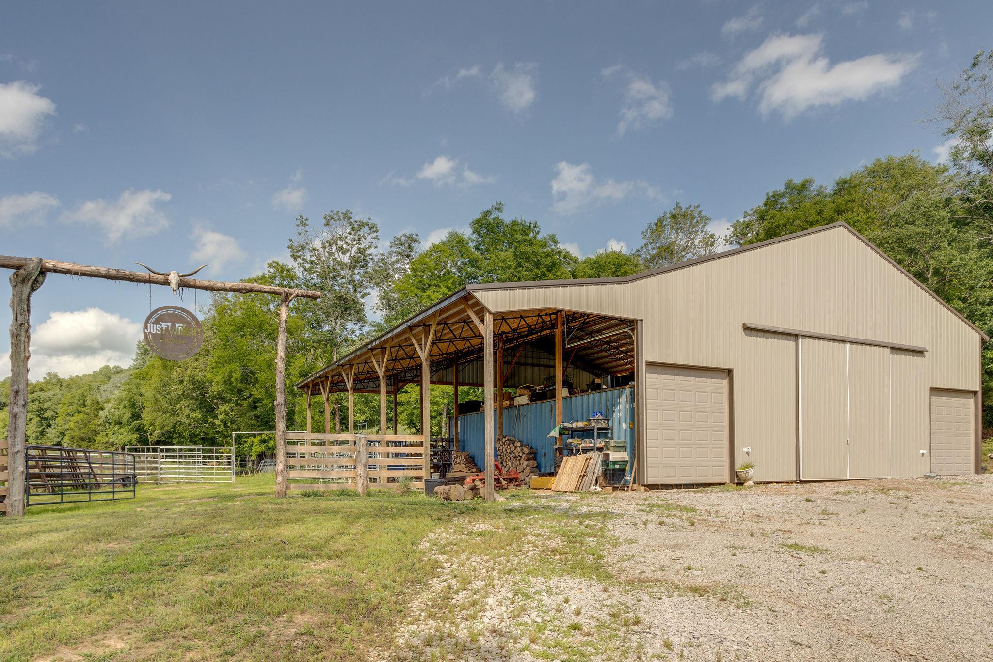 3920 Boston Theta Road Columbia, TN 38401 - Photo 26 of 30 a view of a house with a backyard porch and sitting area