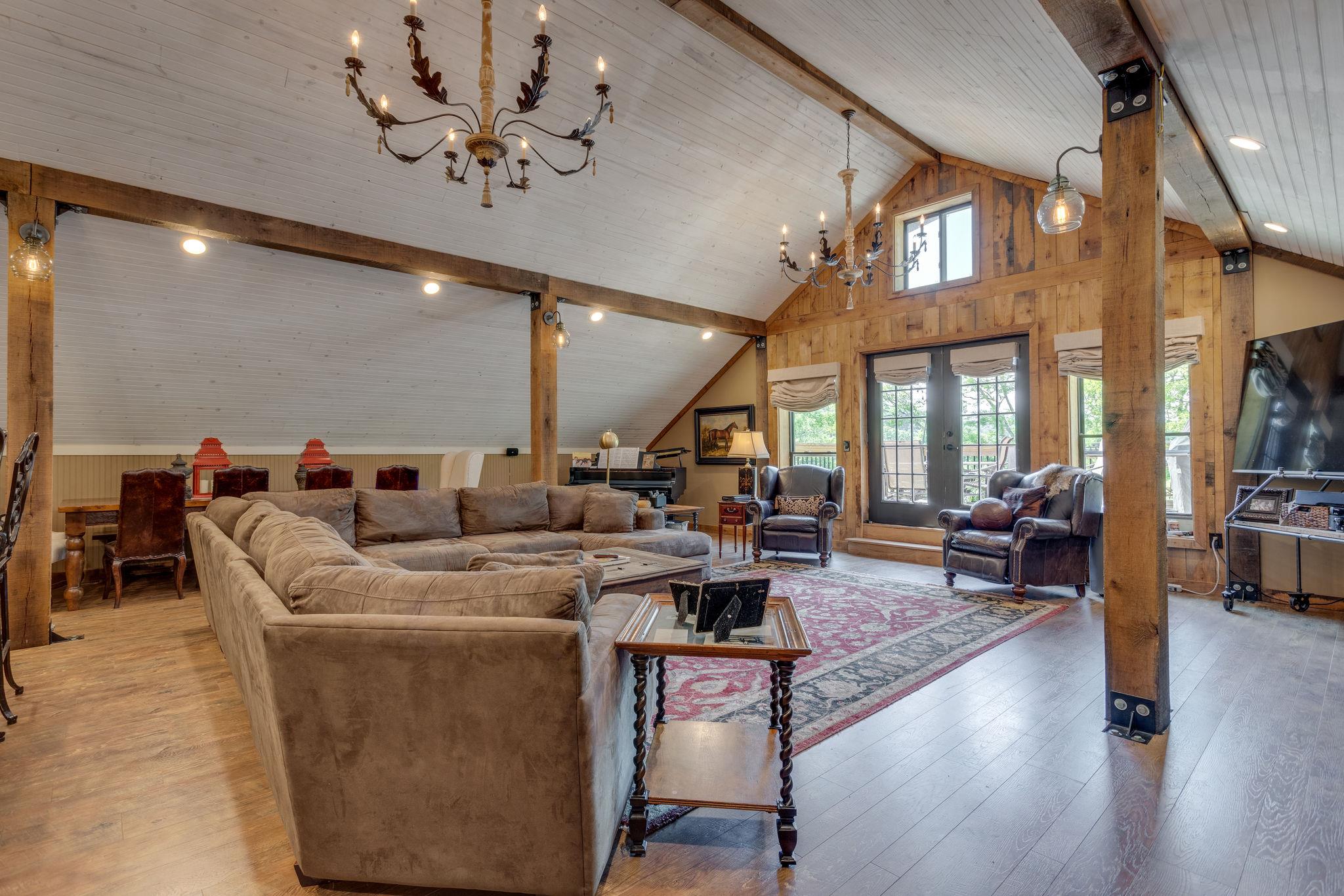 3920 Boston Theta Road Columbia, TN 38401 - Photo 6 of 30 a living room with lots of furniture and a chandelier