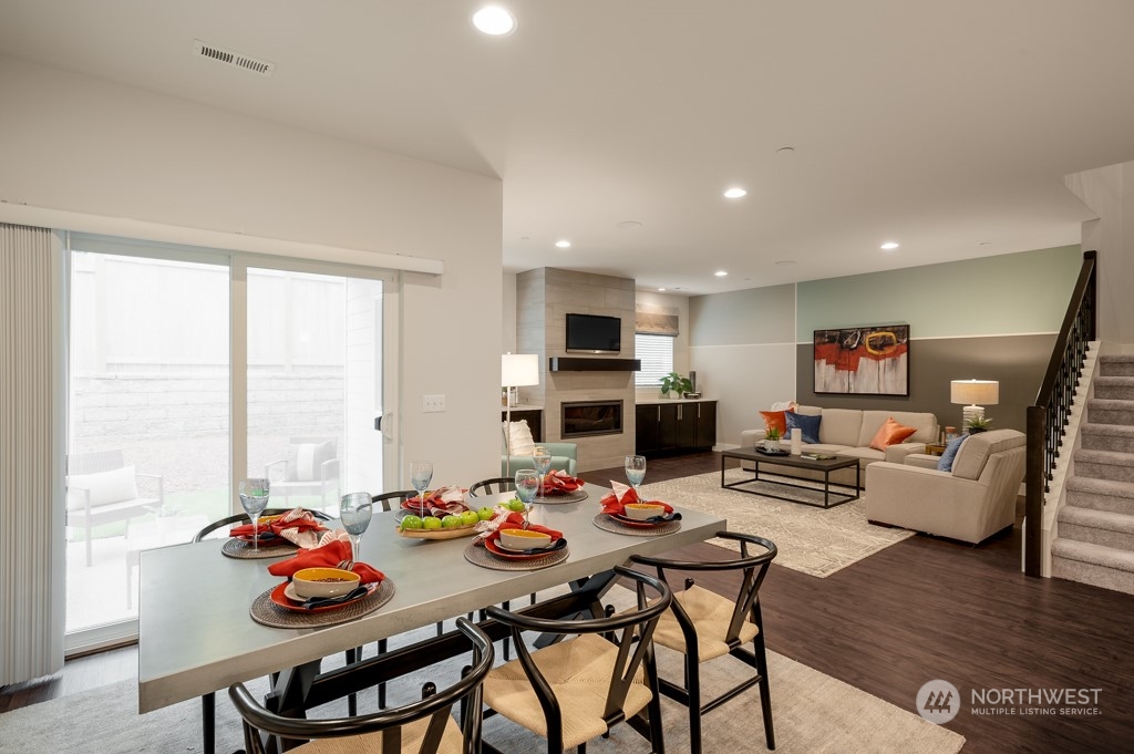 30 177th St S West, Unit IW 81 Bothell, WA 98012 - Photo 13 of 33 a work room with furniture and wooden floor
