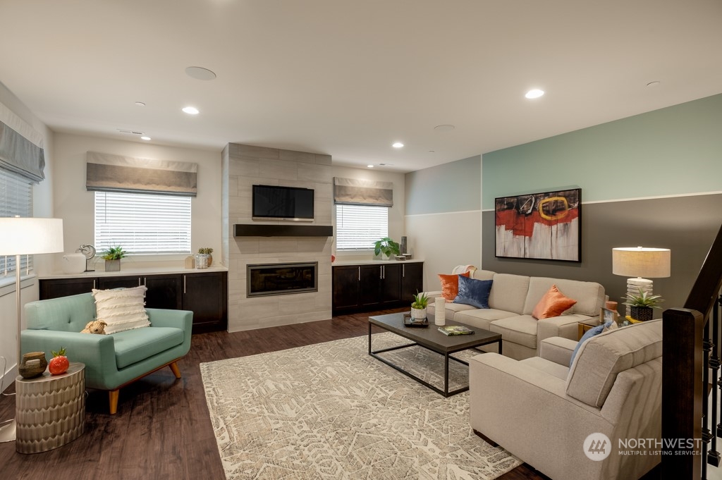 30 177th St S West, Unit IW 81 Bothell, WA 98012 - Photo 15 of 33 a living room with furniture and a flat screen tv