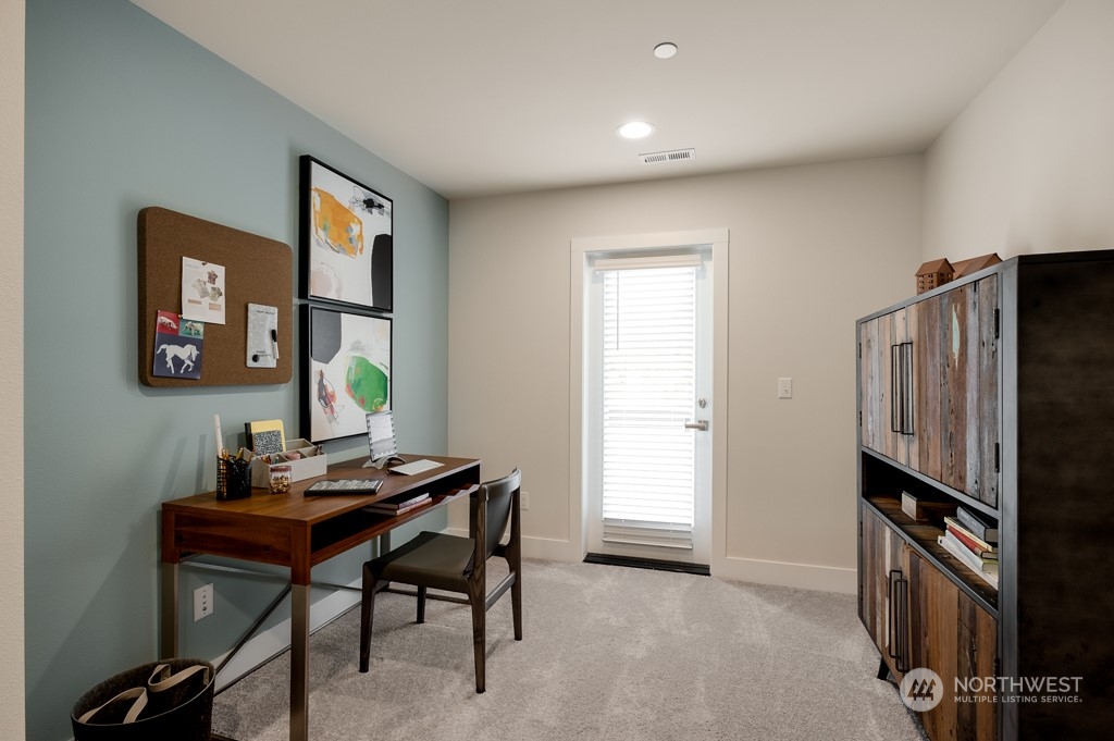 30 177th St S West, Unit IW 81 Bothell, WA 98012 - Photo 18 of 33 a view of a workspace with furniture and a window