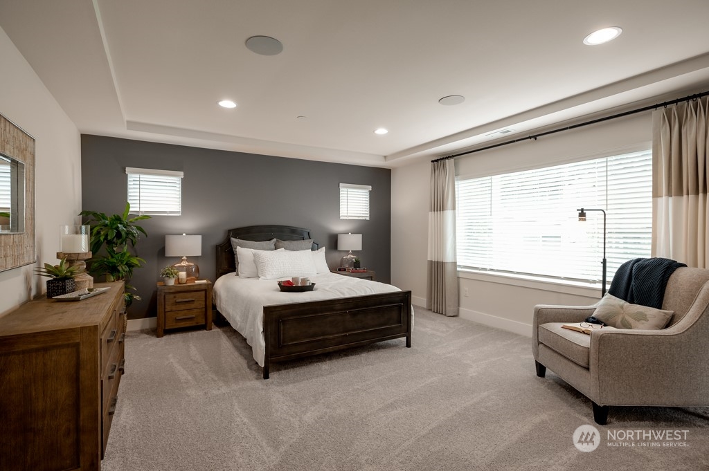 30 177th St S West, Unit IW 81 Bothell, WA 98012 - Photo 19 of 33 a bed room with furniture and a large window