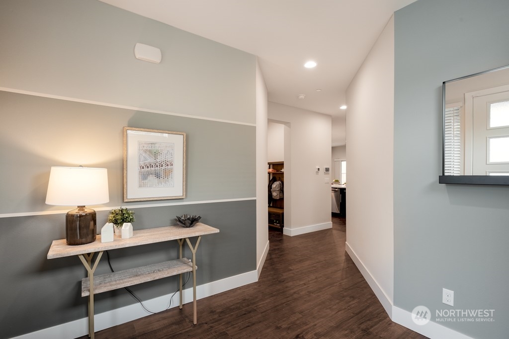 30 177th St S West, Unit IW 81 Bothell, WA 98012 - Photo 2 of 33 a view of a hallway to a livingroom and a couch
