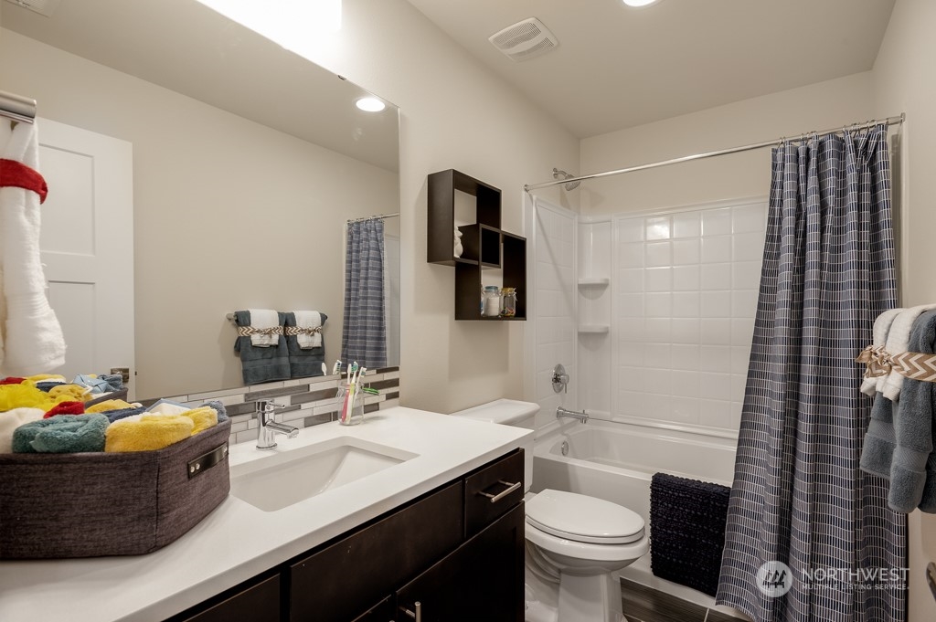 30 177th St S West, Unit IW 81 Bothell, WA 98012 - Photo 28 of 33 a bathroom with a sink toilet and shower