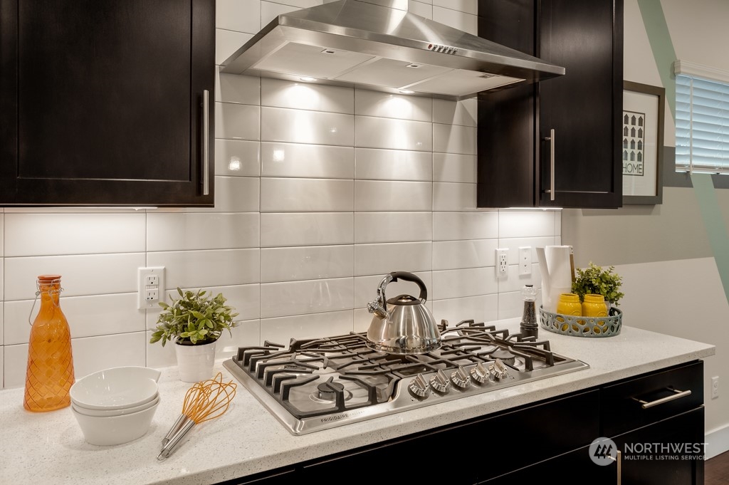 30 177th St S West, Unit IW 81 Bothell, WA 98012 - Photo 8 of 33 a bathroom with a sink a toilet and a mirror