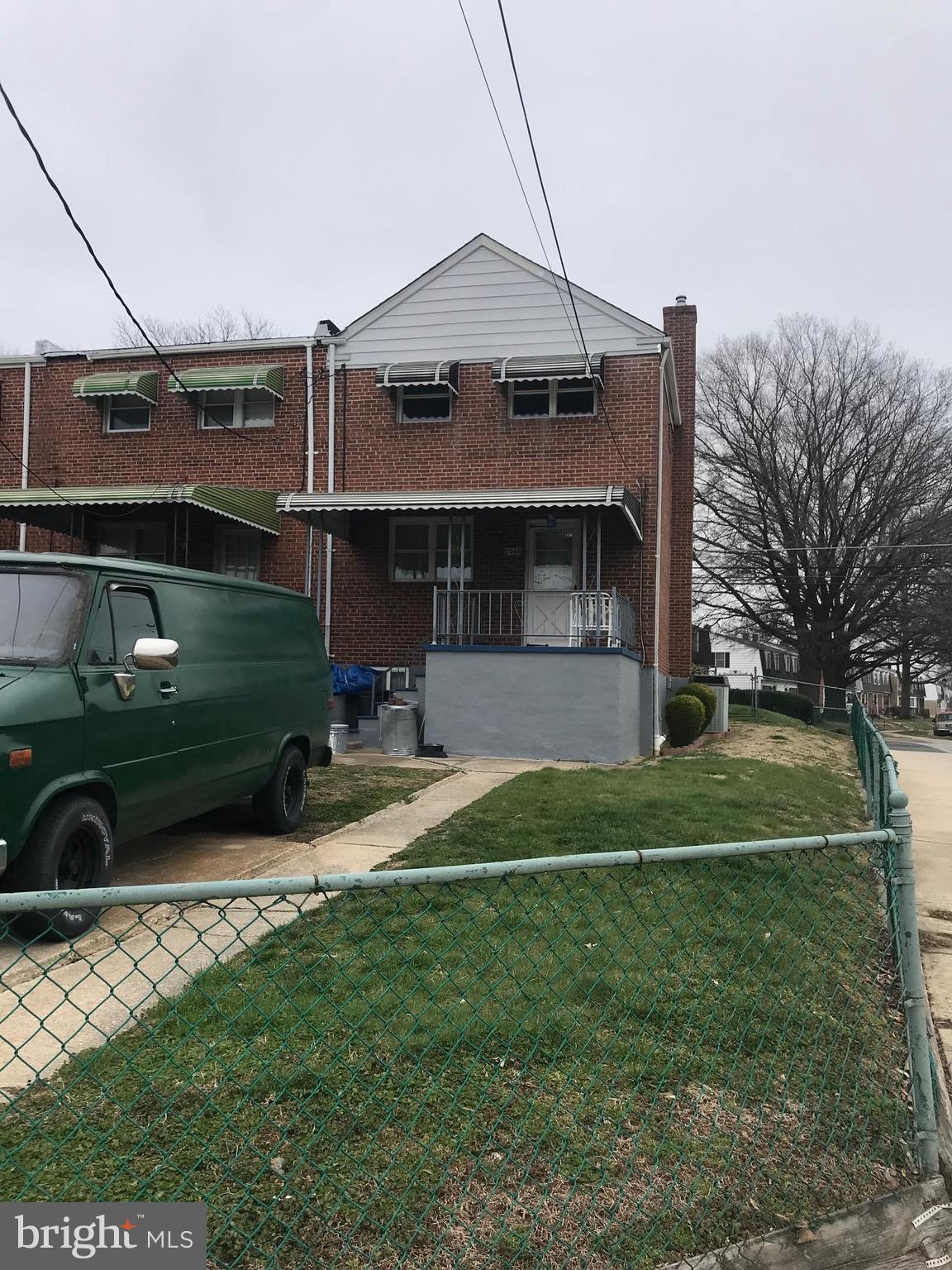 2046 Shore Road Baltimore, MD 21222 - Photo 2 of 11 a front view of a house with garden