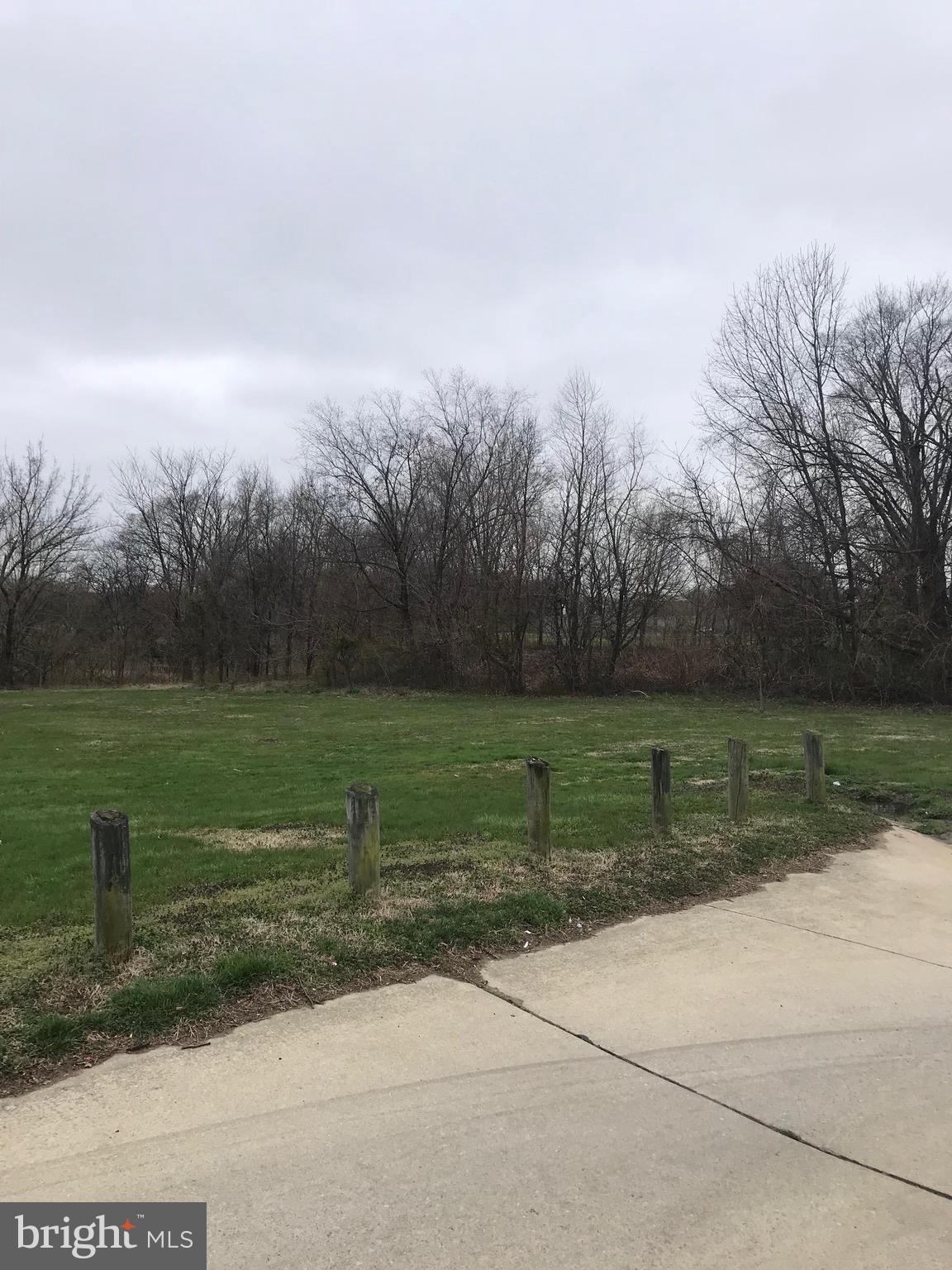 2046 Shore Road Baltimore, MD 21222 - Photo 4 of 11 a view of a golf course with a lake