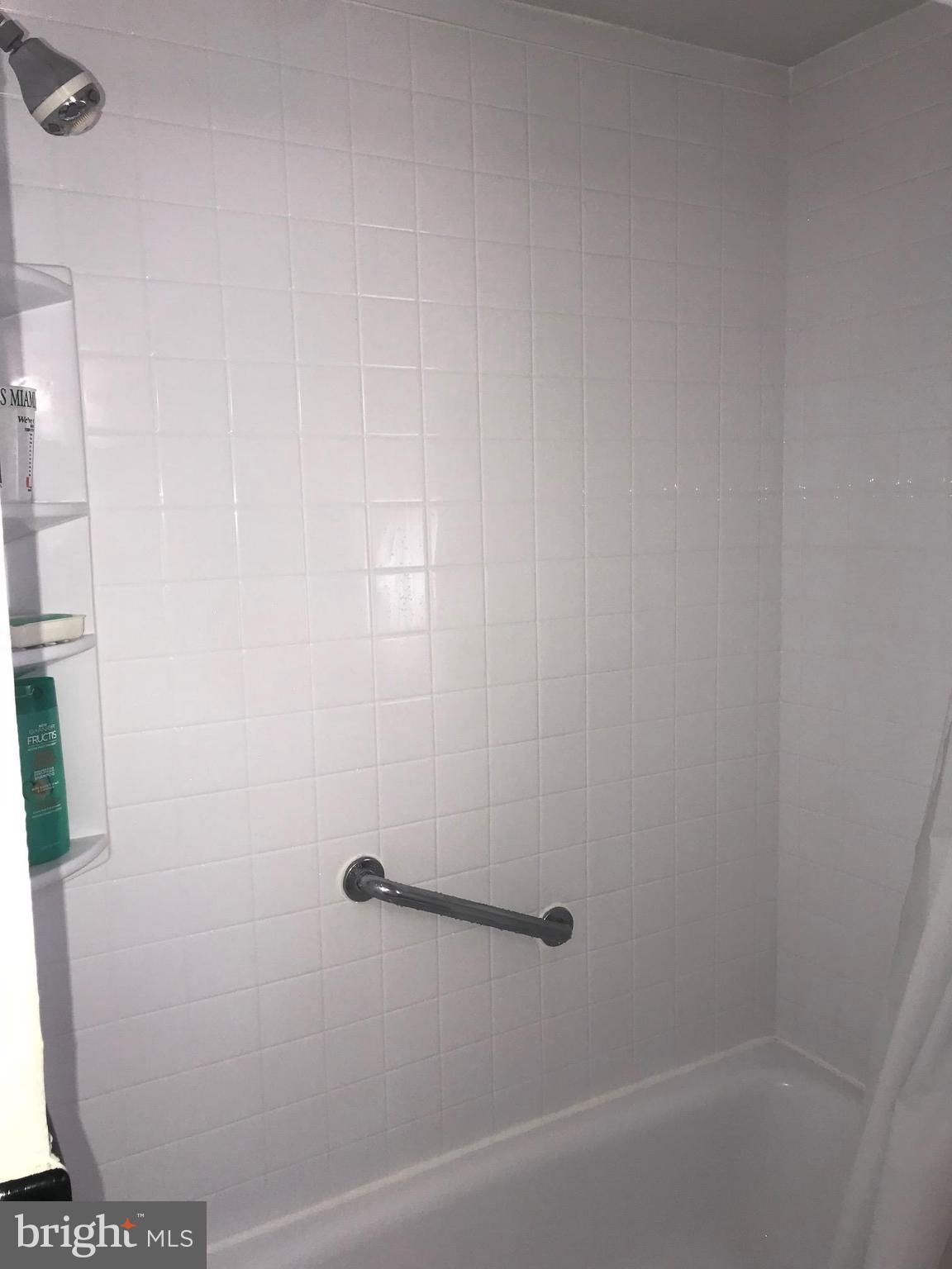 2046 Shore Road Baltimore, MD 21222 - Photo 7 of 11 a bathroom with a shower