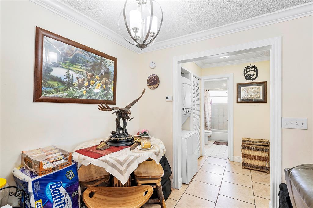 5829 Taylor Street Hollywood, FL 33021 - Photo 14 of 34 a view of a workspace with furniture and a window