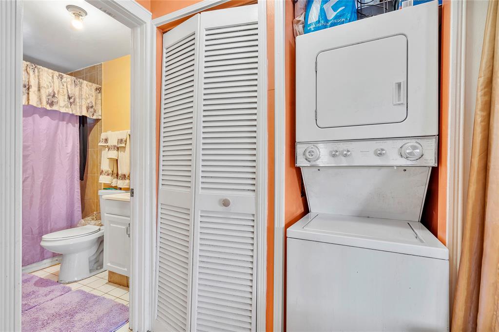 5829 Taylor Street Hollywood, FL 33021 - Photo 31 of 34 a view of bathroom with a toilet and a shower