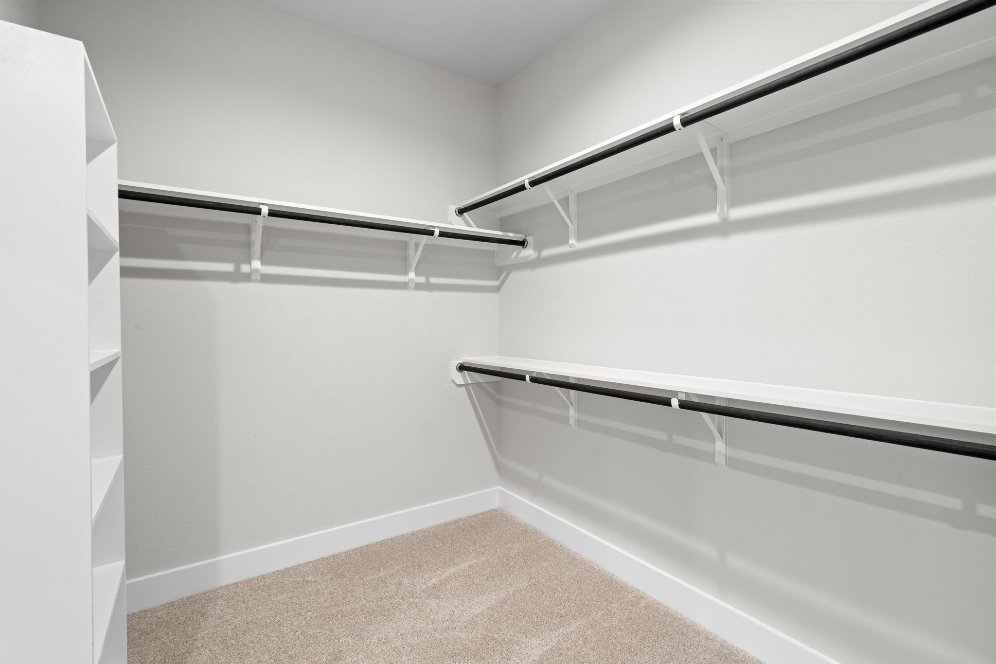 3410 Everglade Lane Rosenberg, TX 77471 - Photo 8 of 16 a view of a room with racks on the wall