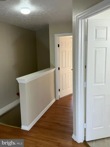 a view of small space with wooden floor