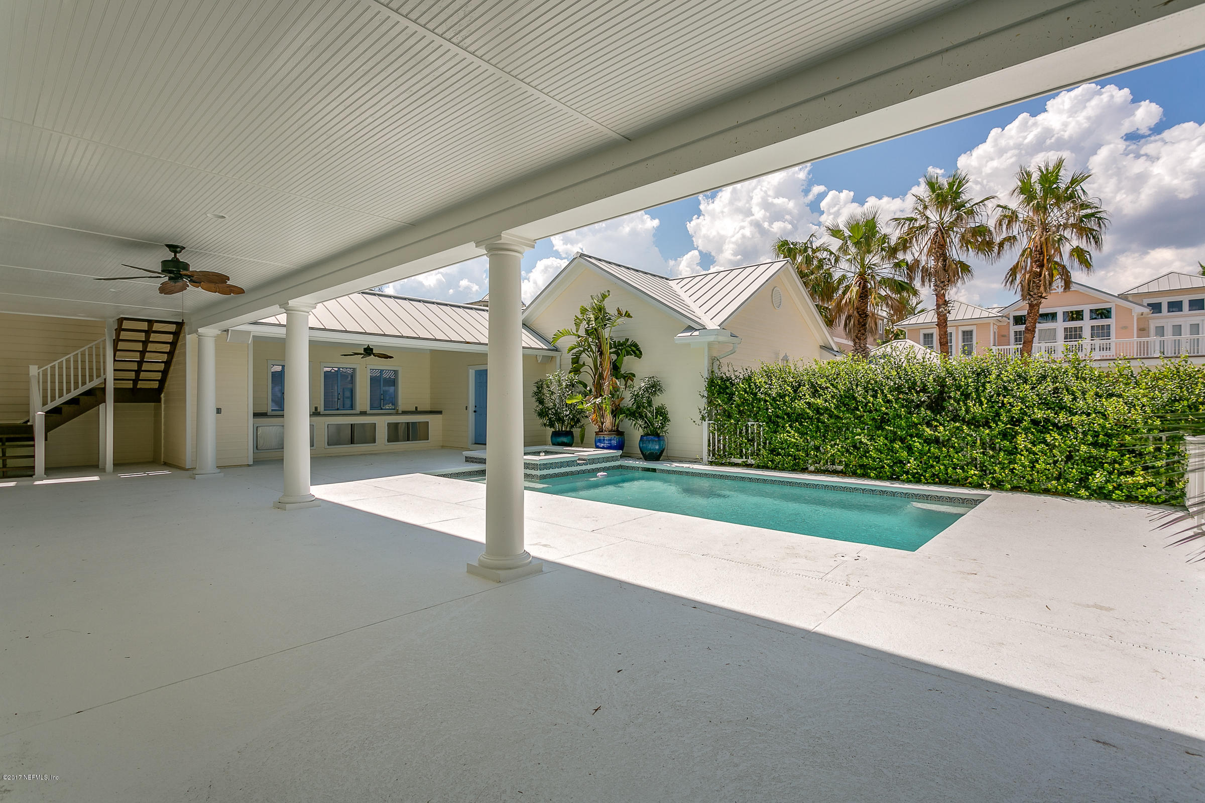 645 Ocean Palm Way St. Augustine, FL 32080 - Photo 15 of 47 a view of a house with a yard