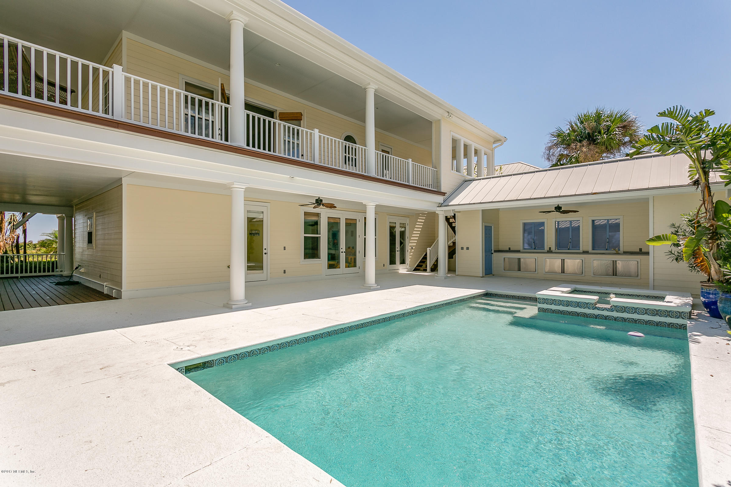 645 Ocean Palm Way St. Augustine, FL 32080 - Photo 16 of 47 front view of a house with a yard