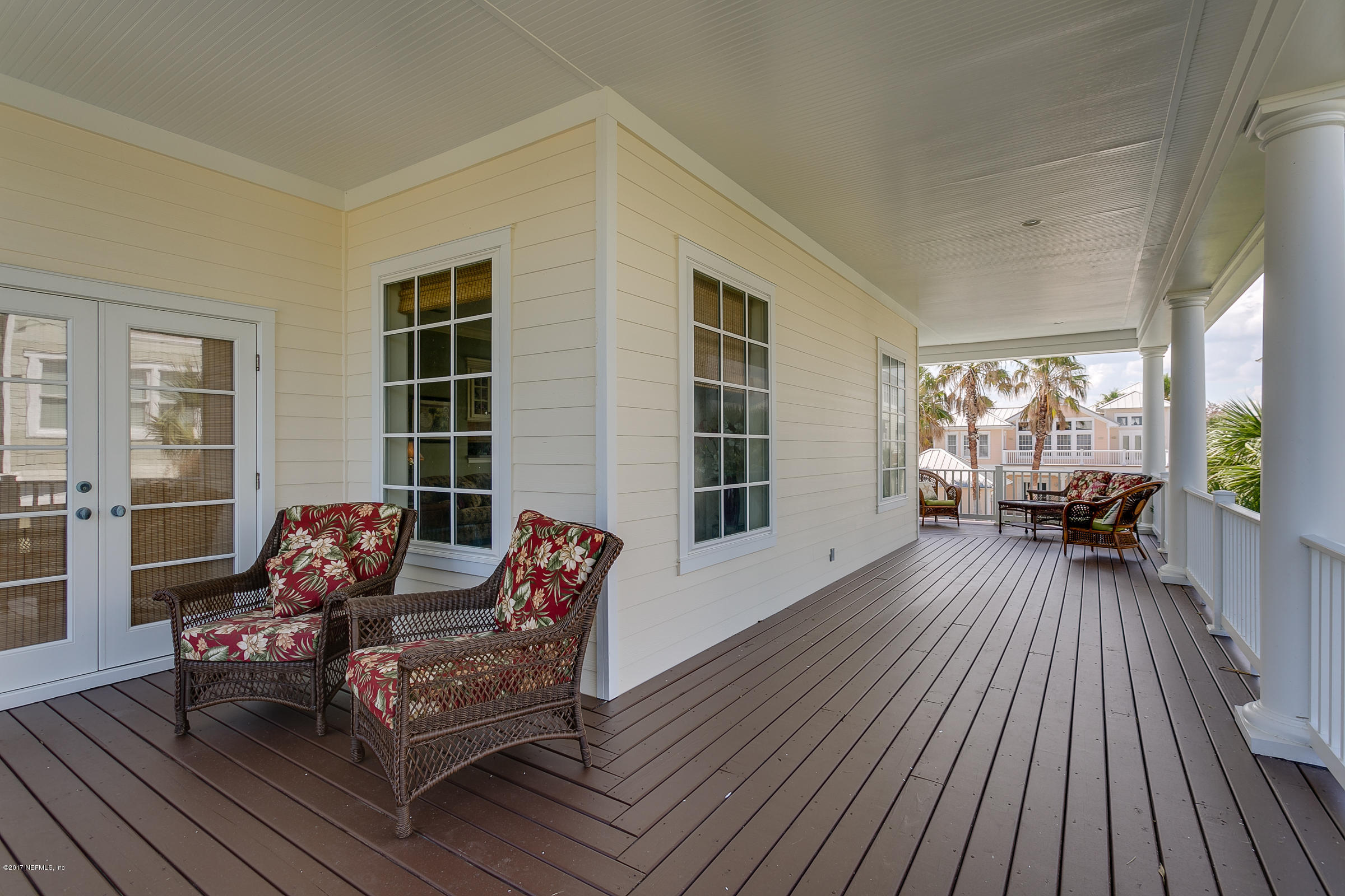 645 Ocean Palm Way St. Augustine, FL 32080 - Photo 35 of 47 a living room with furniture and wooden floor
