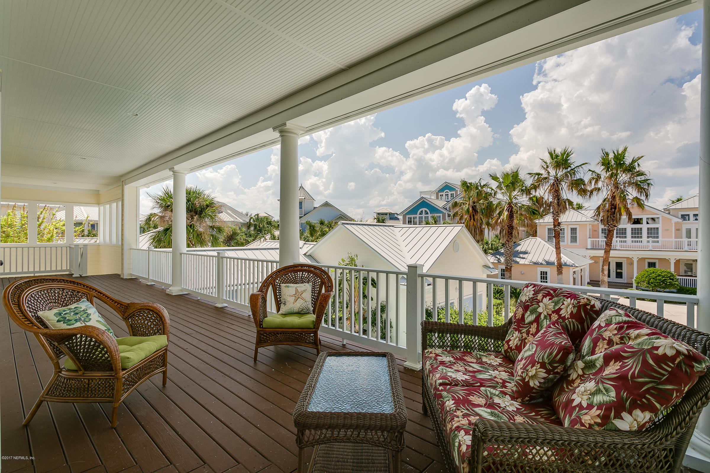 645 Ocean Palm Way St. Augustine, FL 32080 - Photo 36 of 47 a living room with furniture and a large window