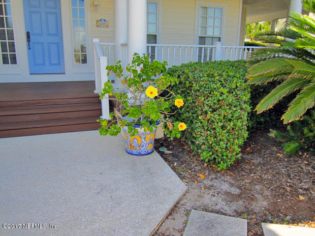 645 Ocean Palm Way St. Augustine, FL 32080 - Photo 40 of 47 a view of a garden with potted plants