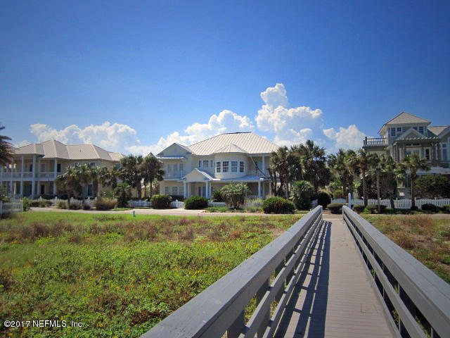 645 Ocean Palm Way St. Augustine, FL 32080 - Photo 45 of 47 a view of a house with a yard