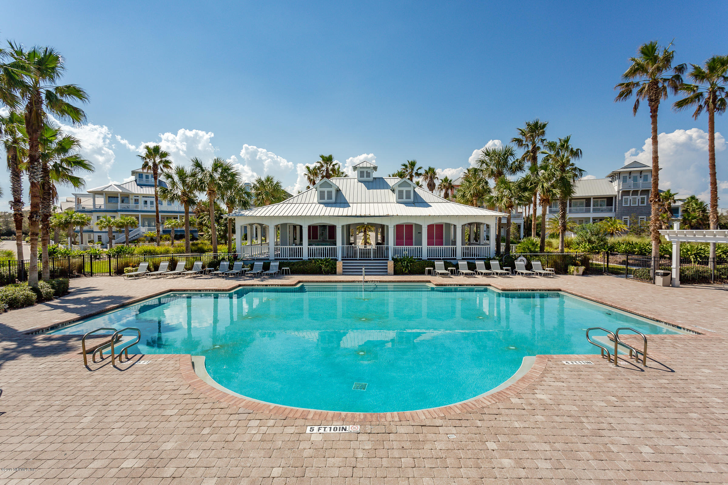 645 Ocean Palm Way St. Augustine, FL 32080 - Photo 46 of 47 a view of a swimming pool with a lounge chair