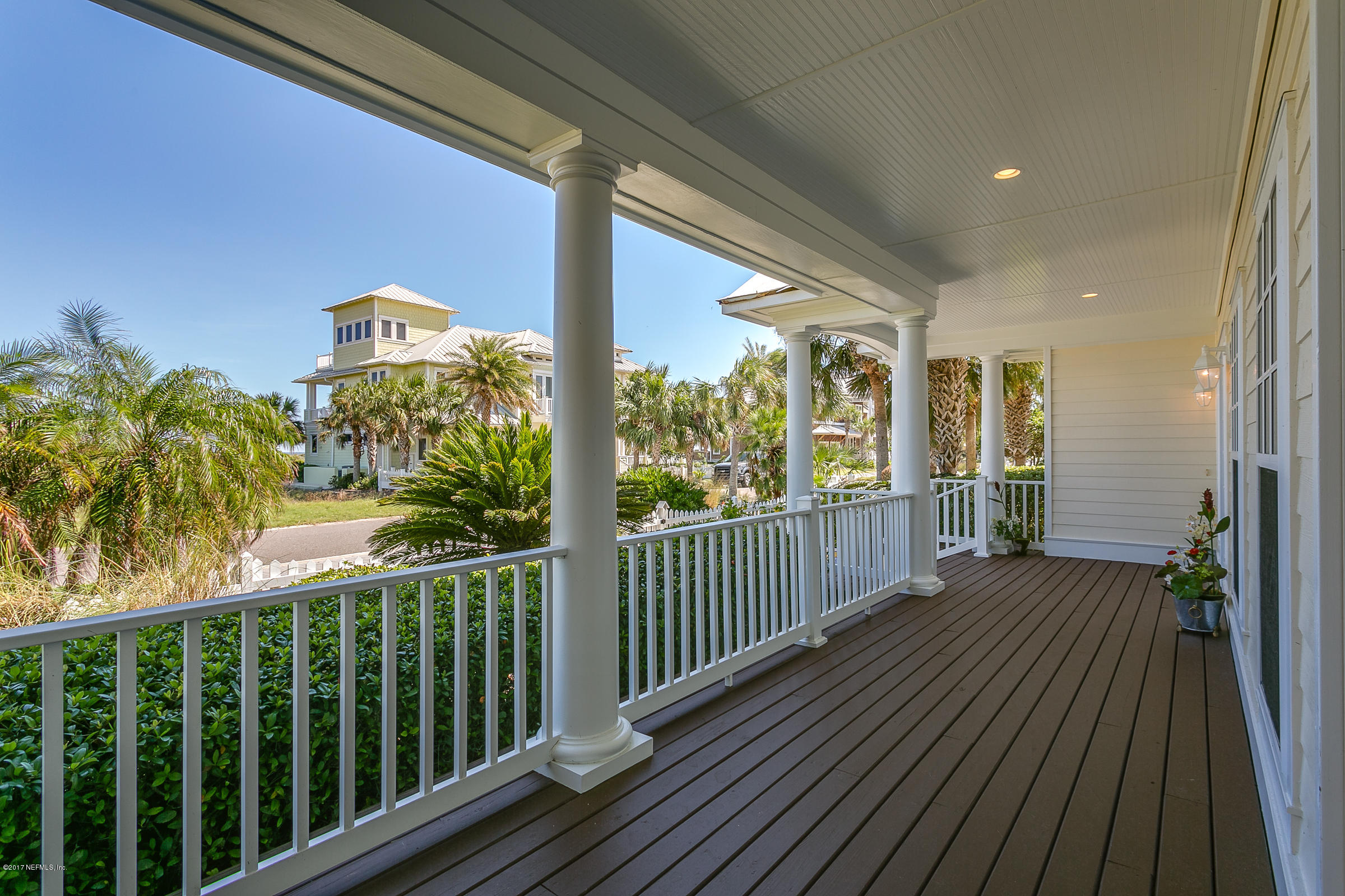 645 Ocean Palm Way St. Augustine, FL 32080 - Photo 5 of 47 a view of a balcony with wooden floor