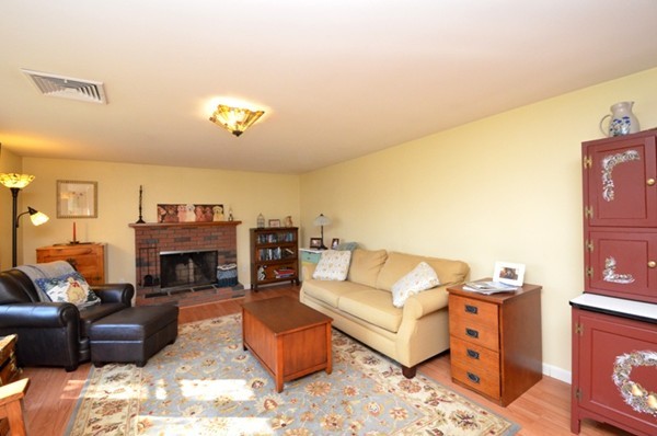 140 Prescott Road Northbridge, MA 01588 - Photo 11 of 22 a living room with furniture and a fireplace