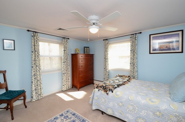 140 Prescott Road Northbridge, MA 01588 - Photo 15 of 22 a bedroom with a bed and a chandelier