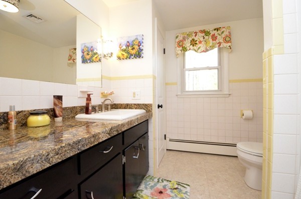 140 Prescott Road Northbridge, MA 01588 - Photo 6 of 22 a bathroom with a granite countertop sink and a mirror