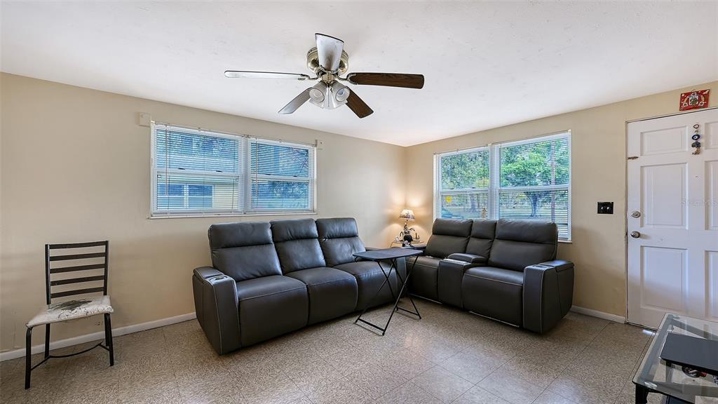 1860 7th Street Sarasota, FL 34236 - Photo 24 of 75 a living room with furniture and a window