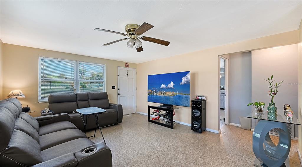 1860 7th Street Sarasota, FL 34236 - Photo 4 of 75 a living room with furniture and a flat screen tv