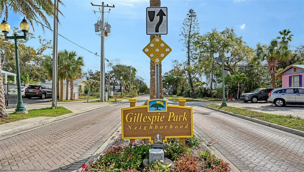 1860 7th Street Sarasota, FL 34236 - Photo 62 of 75 a street sign on a sidewalk next to a road