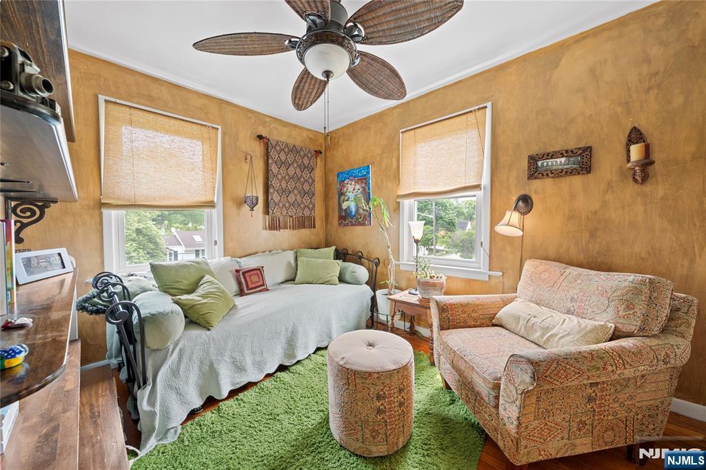 5 Leo Terrace Bloomfield, NJ 07003 - Photo 11 of 32 a living room with furniture and a large window