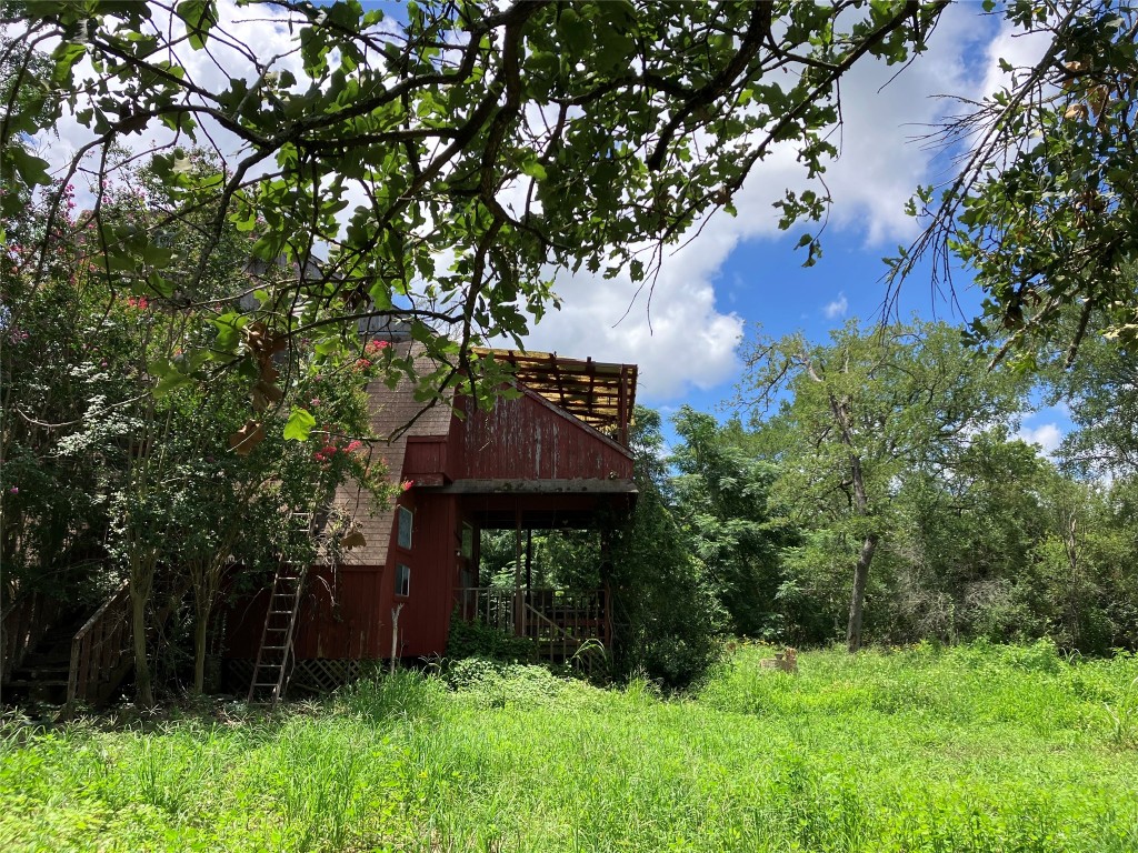 693 St Mary's Road Rosanky, TX 78953 - Photo 12 of 20 A-Frame House in need of repair or removal. Property is secluded with mature native trees.