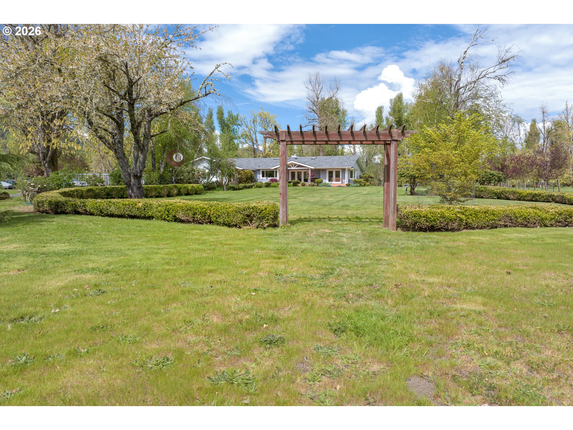 7924 Thurston Road Springfield, OR 97478 - Photo 7 of 45 a view of a fountain in front of the house