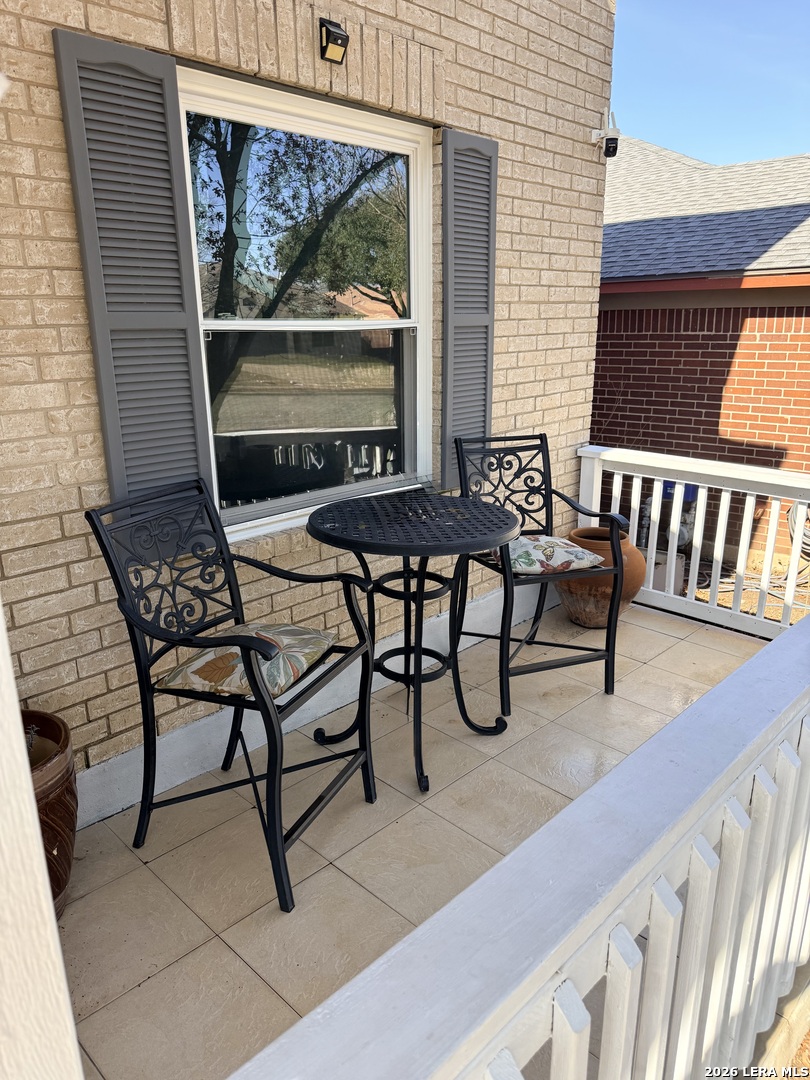 13916 Randalstone Drive Pflugerville, TX 78660 - Photo 4 of 32 a view of a chairs and tables in the balcony