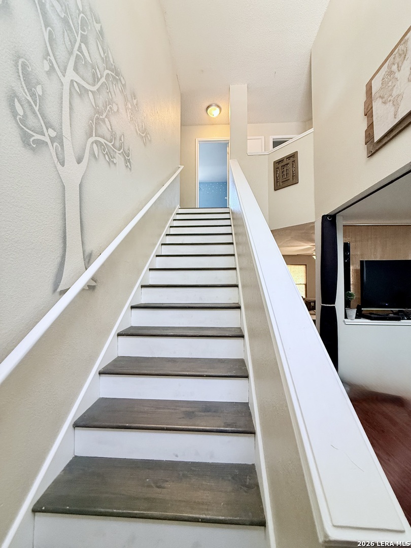 13916 Randalstone Drive Pflugerville, TX 78660 - Photo 5 of 32 a view of entryway and hall with wooden floor