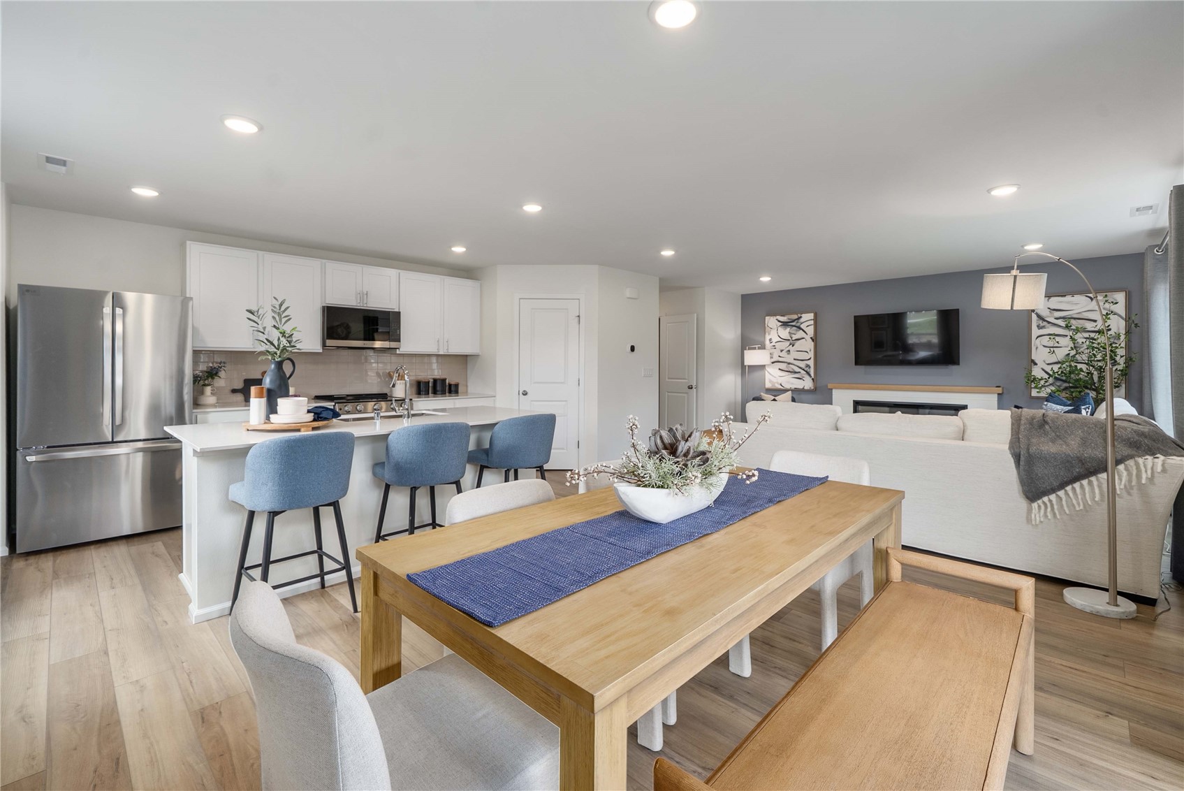 13411 324th Avenue Southeast Sultan, WA 98294 - Photo 11 of 23 a living room with stainless steel appliances a kitchen island hardwood floor and a counter top space